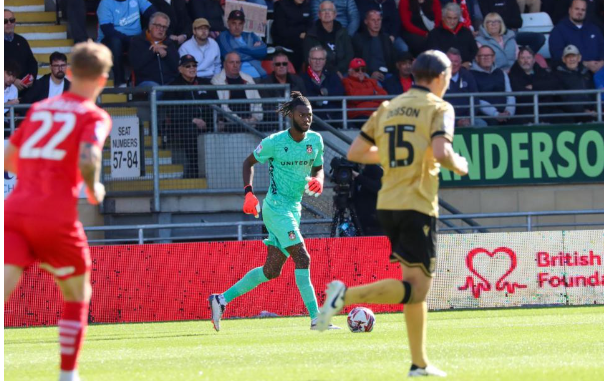 Wrexham goalkeeper Arthur Okonkwo in action at Orient