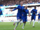 Chelsea's Cole Palmer, centre, celebrates after scoring his second of four first-half goals in a 4-2 win over Brighton on Saturday at Stamford Bridge in London.